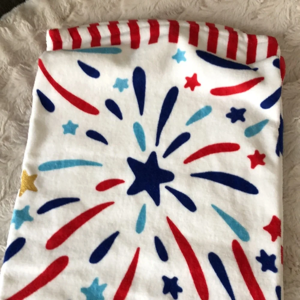 White Beach Towel with Red, Blue and Light Blue Starburst Print